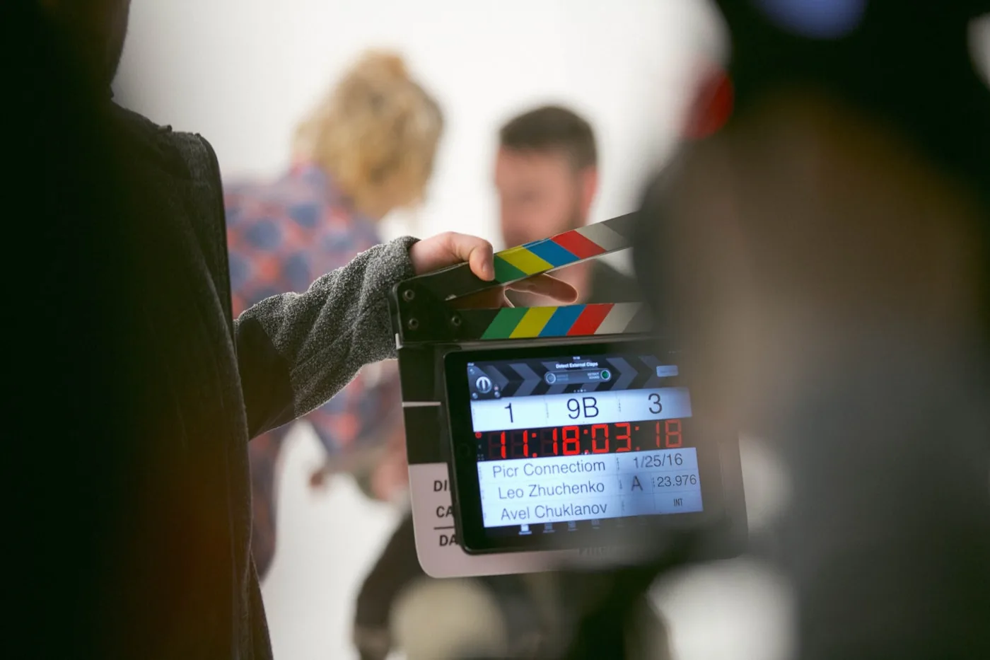 A clapperboard marked up on set before a take