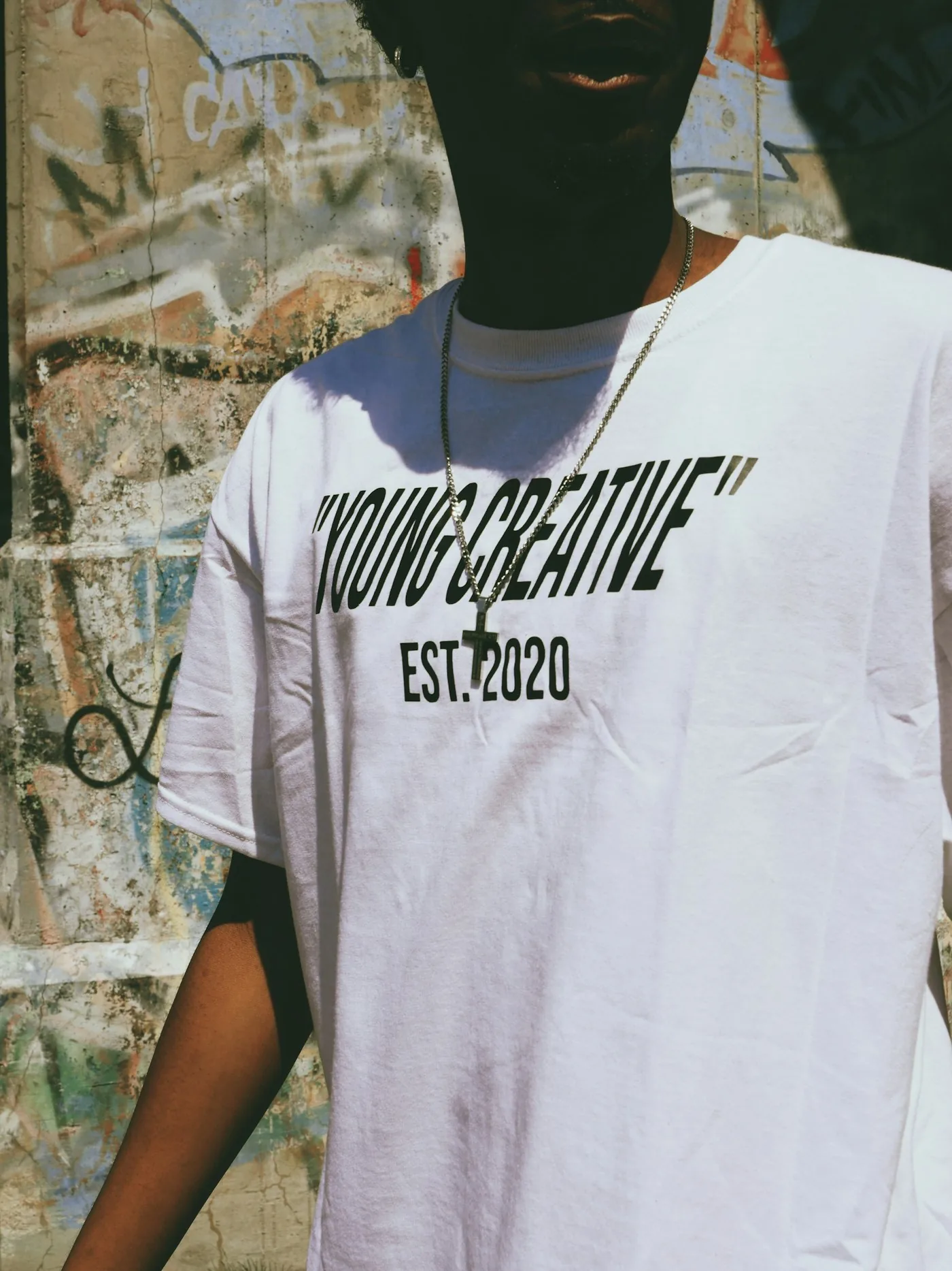 A t-shirt printed with the words young creative