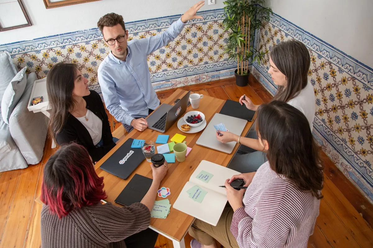 A facilitator leading a working session with a small group